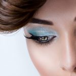 Woman's eye with blue eye makeup